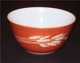   from Pyrexs Wheat pattern. This bowl is paprika, or rust, in color