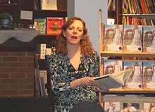 Willig reads from The Garden Intrigue at a book signing event, Ann 