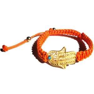 Orange Macrame Bracelet Accentuated By a 22 Karat Gold Plated Hamsa 