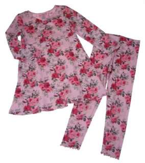This set includes the pink floral dress and leggings in very good 