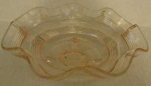 PINK DEPRESSION FOOTED GLASS BOWL W/RUFFLED EDGE  