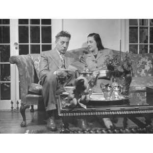 Ezio Pinza and His Daugher, Claudia, Chatting Together on a Sofa 