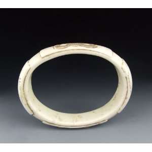 Pair of Carved Jade Bracelets with Mask Pattern from Liangzhu Culture 