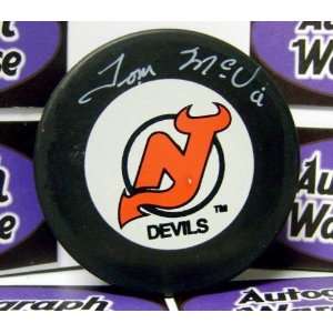 Tom McVie autographed New Jersey Devils hockey puck   Autographed NHL 