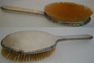   bristle plate is original to the brush and also in great condition