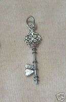 Sterling Silver Fancy Skeleton Key with Hearts Charm  