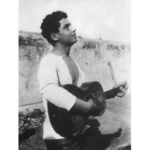  Portrait of a Young Sicilian Man Playing the Guitar 