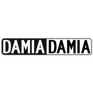   NEGATIVE DAMIA  STREET SIGN