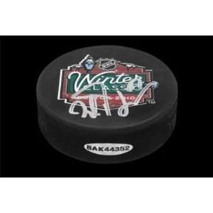 Milan Lucic Signed Boston 2010 Winter Classic Puck Uda