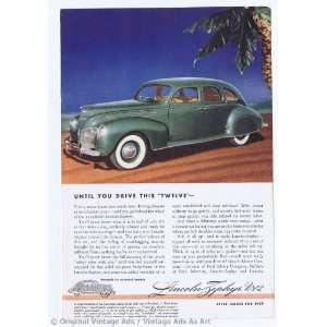   Lincoln Zephyr V12 Sports Sedan on beach Vintage Ad 