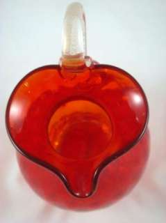 Small cranberry pitcher made with genuine Venetian glass in Murano 