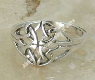   four elongated triquetra symbols create the focal point of this ring