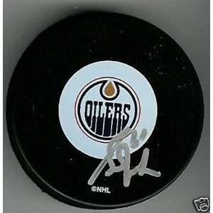 Grant Fuhr Signed Hockey Puck   w COA   Autographed NHL Pucks