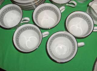 up for bid is a beautiful vintage 41 piece set of