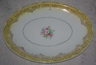 am offering this beautiful 11 3/4 x 8 1/2 Porcelain Oval Serving 
