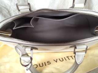100% Authentic NEW Louis Vuitton Alma NM bag in cream Epi leather.