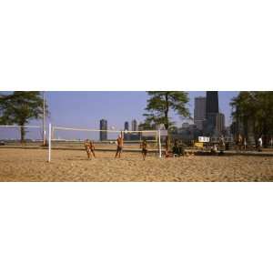 Group of People Playing Beach Volleyball, Chicago, Illinois, USA 