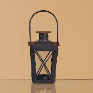 Thistraditional black candle lantern is perfect to hang outdoors at 