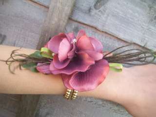 Beautiful Burgundy Bronze metallic Orchid cluster wrist corsage.