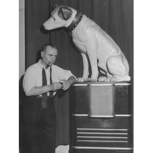 Jose Iturbi Standing Beside Listening Dog Trade Mark of RCA Victor 