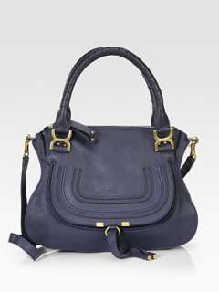 EXCLUSIVELY AT SAKS in Royal Blue. Luxe calfskin defines this 