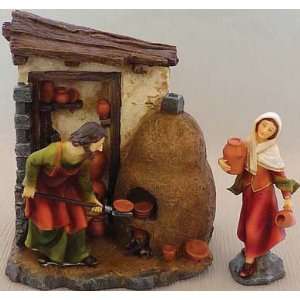 Polyresin Nativity Village   Bread Market   Two Pieces   Woman With 